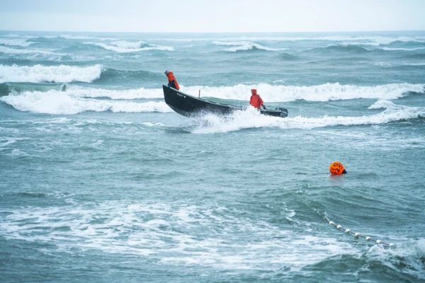202103_Small boat fishing the mouth of Situk River_BG-Web JPG